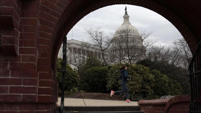 A jogger runs past the US Capitol Building in Washington last week. Picture: Getty Images/AFP