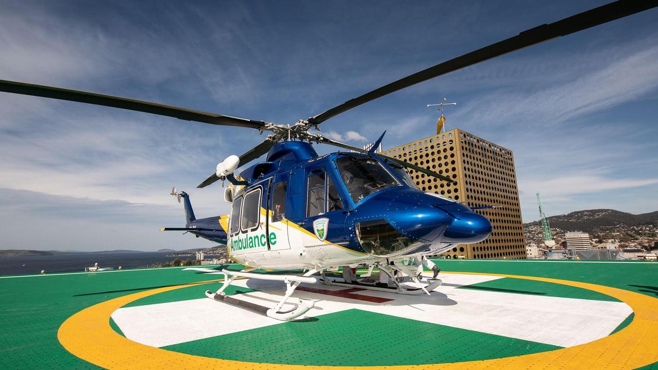An ambulance helicopter on the new helipad at the Royal Hobart Hospital.