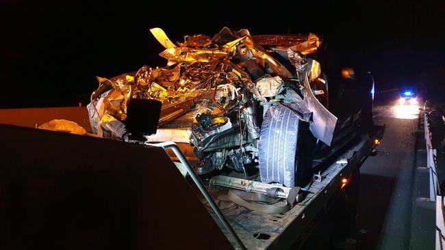 The aftermath of a single-vehicle crash on the Bruce Highway south of Gympie on Thursday night. Photos: Frances Klein