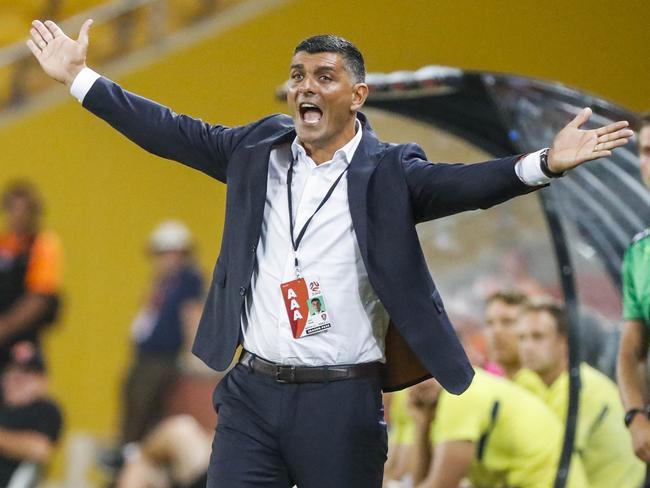 Roar coach John Aloisi shouts from the sidelines during the Round 25 A-League match between Brisbane Roar and the Central Coast Mariners at Suncorp Stadium in Brisbane, Saturday, March 31, 2018. (AAP Image/Glenn Hunt) NO ARCHIVING, EDITORIAL USE ONLY