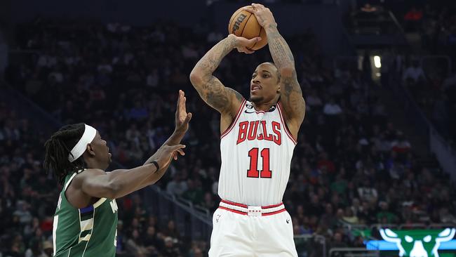 DeMar DeRozan of the Chicago Bulls shoots over Jrue Holiday of the Milwaukee Bucks. Picture: Stacy Revere/Getty Images
