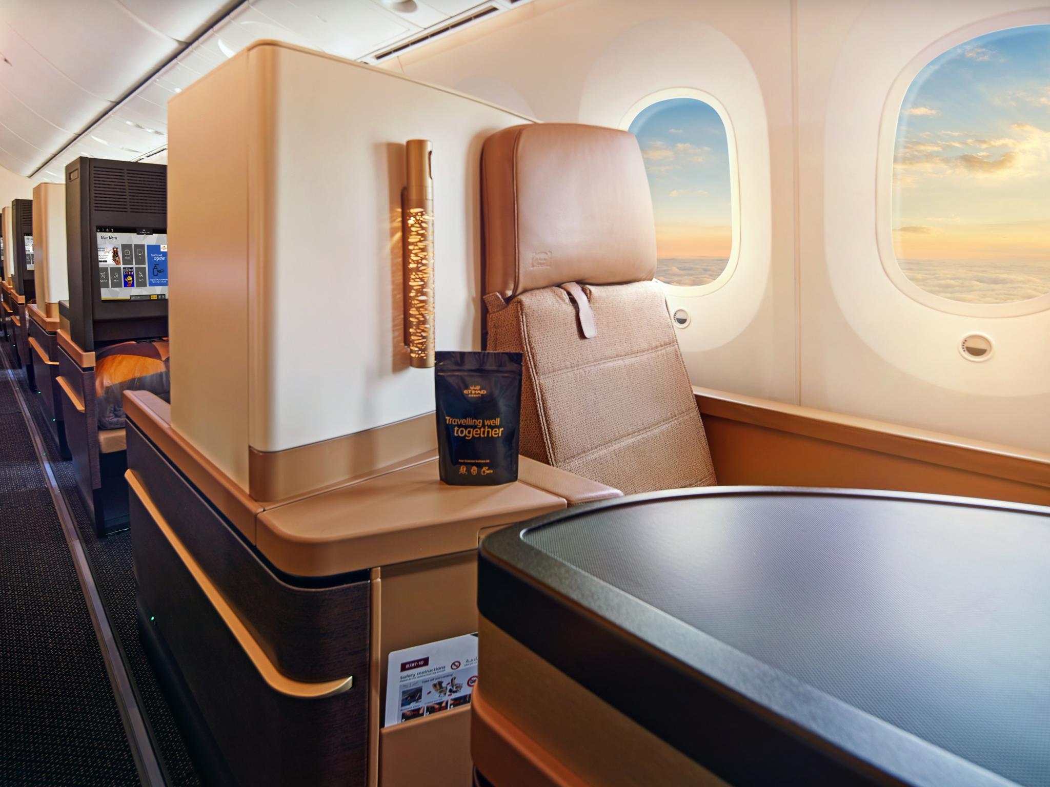 Etihad business class cabin cheap baggage allowance