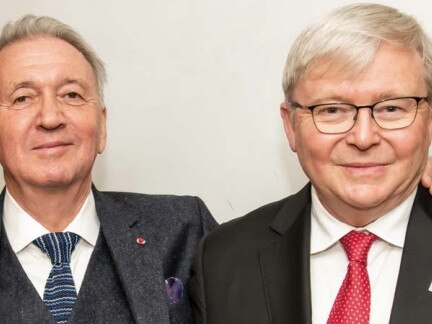 Image from annual reports of the International Peace Institute .picture of the IPI director  Terje Rød-Larsen, with his arm on Kevin  Rudd....!