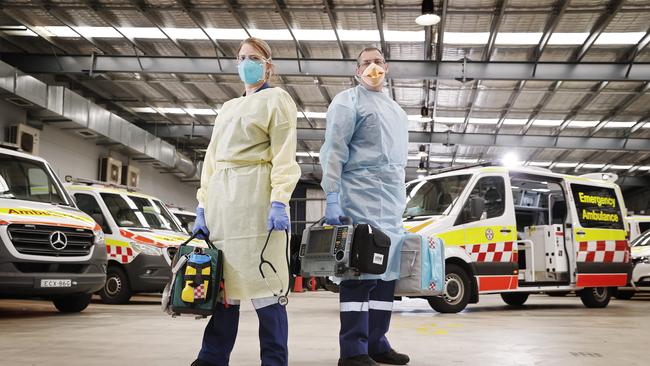 NSW Paramedics from Blacktown LGA Naomi Batten and Jason Ryan in their PPE. Picture: Sam Ruttyn