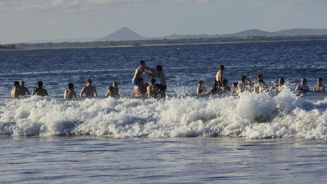 Water fights in the water at Mooloolaba. Photo: Mark Furler