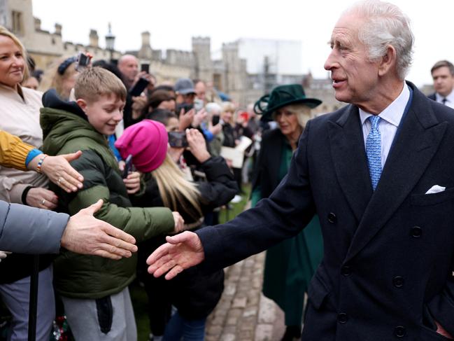 King Charles III and Queen Camilla greet people after attending the Easter Mattins Service at Windsor Castle on March 31, 2024 in Windsor. Picture: Hollie Adams/WPA Pool/Getty Images