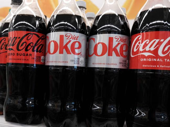 NEW YORK, NEW YORK - JULY 14: Bottles of Coca-cola products including Diet Coke which contains the artificial sweetener aspartame are displayed on a store shelf on July 14, 2023 in New York City. The World Health Organization classified the sugar substitute aspartame, which is used in numerous food products, as a possible carcinogen, but the group said it is safe for people to consume within the recommended daily limit. (Photo illustration by Spencer Platt/Getty Images) (Photo by SPENCER PLATT / GETTY IMAGES NORTH AMERICA / Getty Images via AFP)