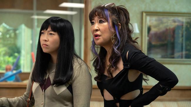 Akwafina and Sandra Oh play sisters who are a decade apart. Picture: 20th Century Fox