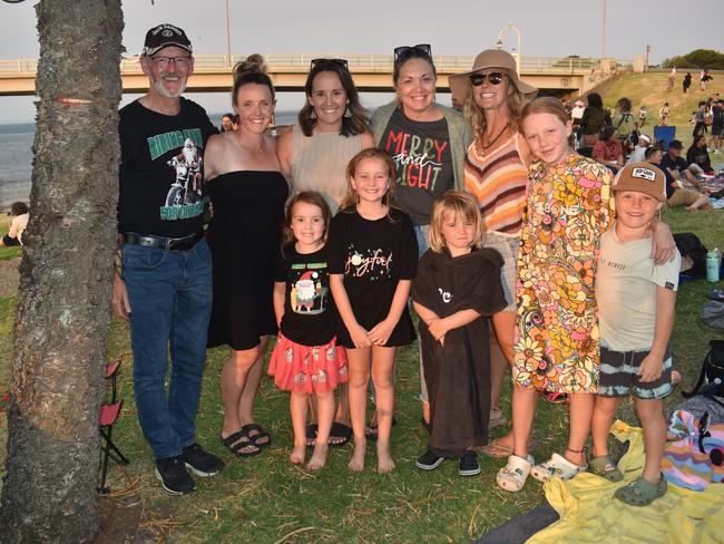 Peter Hardy, Kate Williams, Meg Oudshoorm, Sarah Pedersen, Laura-Bo Kimber, Evie Ruben, Scarlett, Macie, Sophie at the San Remo Christmas Carols at the foreshore on Friday, December 20, 2024. Picture: Jack Colantuono