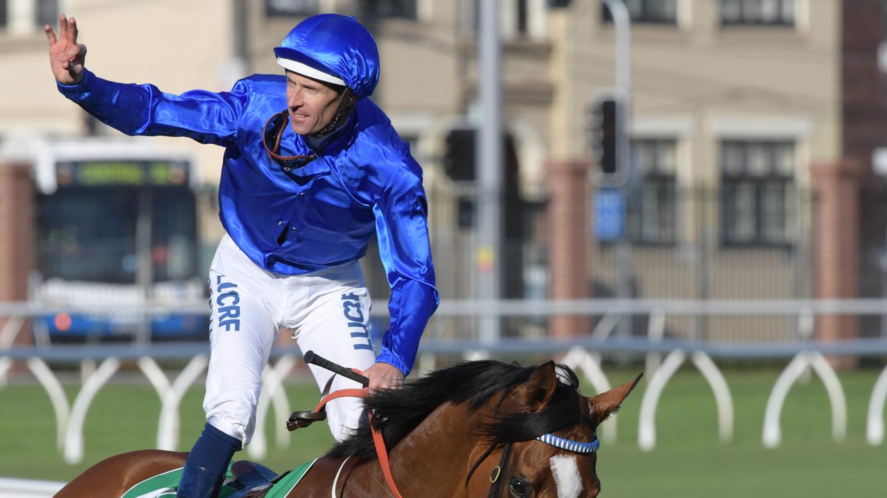 Hugh Bowman celebrates on his return to scale after riding Hartnell to victory in the TAB Epsom Handicap in Sydney last year — the Epsom is one of the first G1 races in SuperCoach Racing