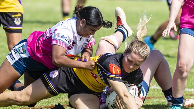 Sarah Hoger of Gatton is tackled by a Brothers players. Picture: Kevin Farmer