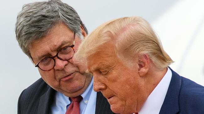 Former US Attorney-General William Barr and Trump. Picture: AFP