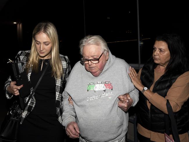 22-06-2022 - Former swim coach Dick Caine, who is facing child sex abuse charges, leaves Bankstown police station with wife Jenny and lawyer Sophie Newham after receiving bail.  Picture: Liam Mendes / The Australian