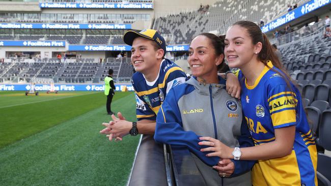 Eels fans Danissa Reid with her children Tiana, 14, and Christian, 15, from Bossley Park, at the open day. Picture: David Swift