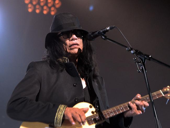 (FILES) US singer and musician Sixto "Sugar Man" Rodriguez performs on stage during a concert at the Zenith  on June 4, 2013 in Paris. Rodriguez, the once obscure American singer-songwriter who found a career renaissance after his music developed a cult following abroad, died on August 8, 2023, at the age of 81, according to his website. (Photo by PIERRE ANDRIEU / AFP)