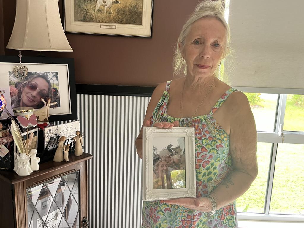 Sandra McGrath with the memorial for her daughter Vicky, set up in her Bidwill home, following her daughter’s death which Ms McGrath said would not have happened if the road had been sealed.