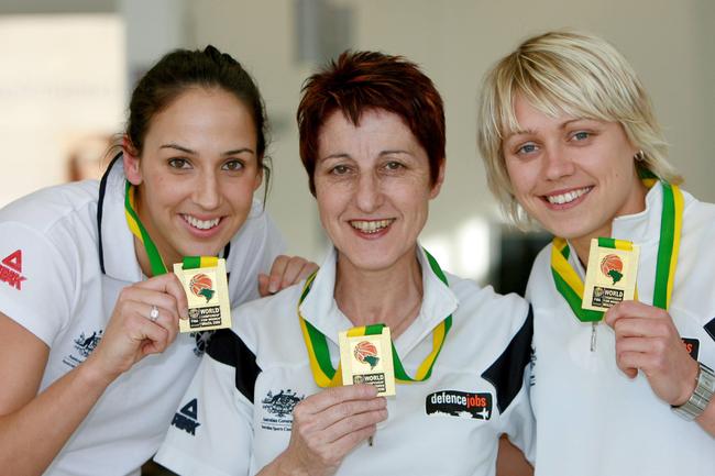 Basketballer Erin Phillips (right), Jan Stirling and Laura Summerton with their Gold Medals from the World Championships.
