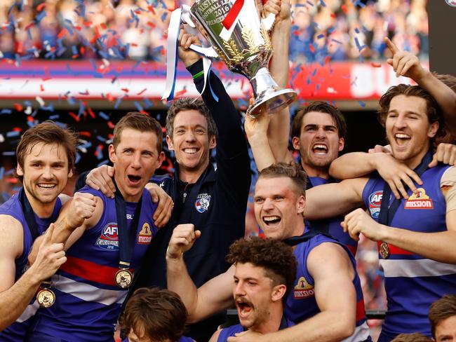 MELBOURNE, AUSTRALIA - OCTOBER 01: Bulldogs players celebrate during the 2016 Toyota AFL Grand Final match between the Sydney Swans and the Western Bulldogs at the Melbourne Cricket Ground on October 01, 2016 in Melbourne, Australia. (Photo by Adam Trafford/AFL Media/Getty Images)