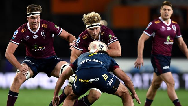 Angus Scott-Young on the charge for the Reds . Picture: Getty Images