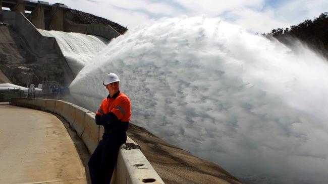 The floodgates of Jindabyne Dam open.