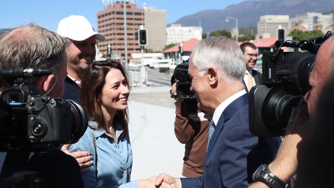 Andrew and Belinda Reeve-Parker, who are visiting Hobart, meeting Prime Minister Malcolm Turnbull on the city’s waterfront. Picture: LUKE BOWDEN