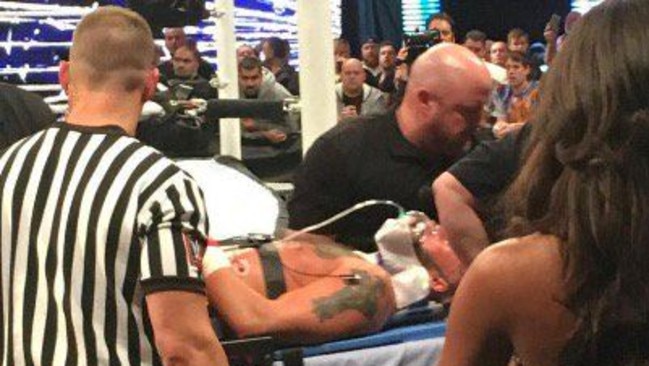 Enzo Amore is stretchered out of the arena at WWE Payback.