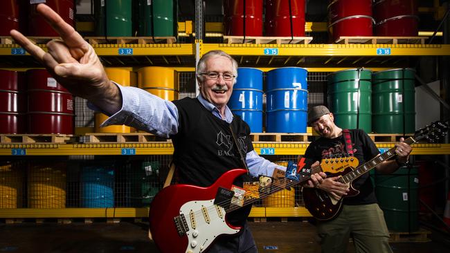 Royal Australian Mint CEO Ross MacDiarmid, left, and general manager Mark Cartwright gear-up for the release of the AC/DC coin set. Picture: Sean Davey