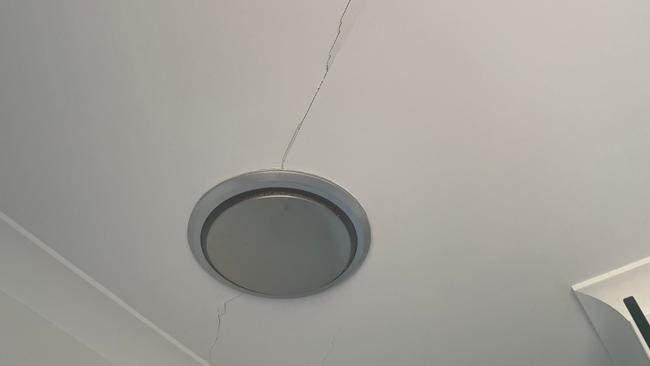 Cracks are forming on the roof of a Hervey Bay couple's home that is sinking.