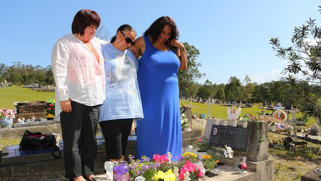 Leonie Duroux and Evelyn Greenup's two aunties, Clarice Greenup and Michelle Jarrett, mark the anniversary or Evelyn’s murder in 2014. Picture: Frank Redward