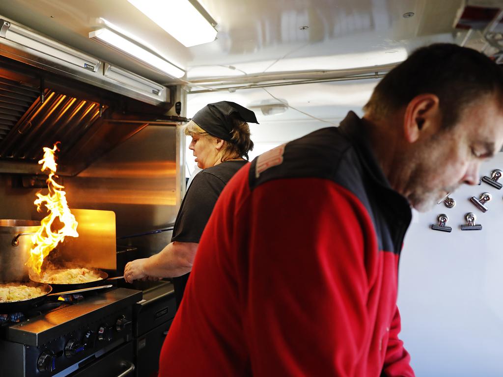 Food truck owners Sabine Cool and husband Jeff, who operate at a NASA complex in Huntsville, Alabama, normally take $A1000-$1400 per day, but are averaging $US400-$500. Picture: AP Photo/David Goldman 