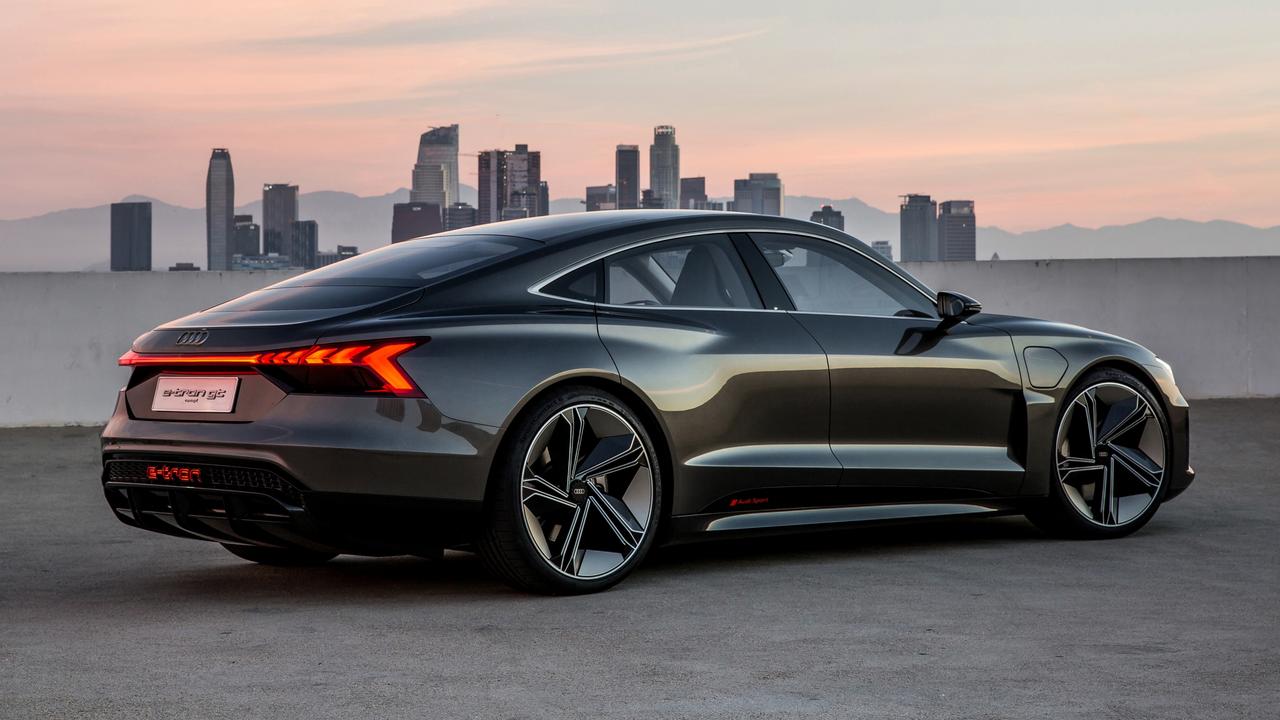 The e-tron GT features a swoopy coupe roofline.