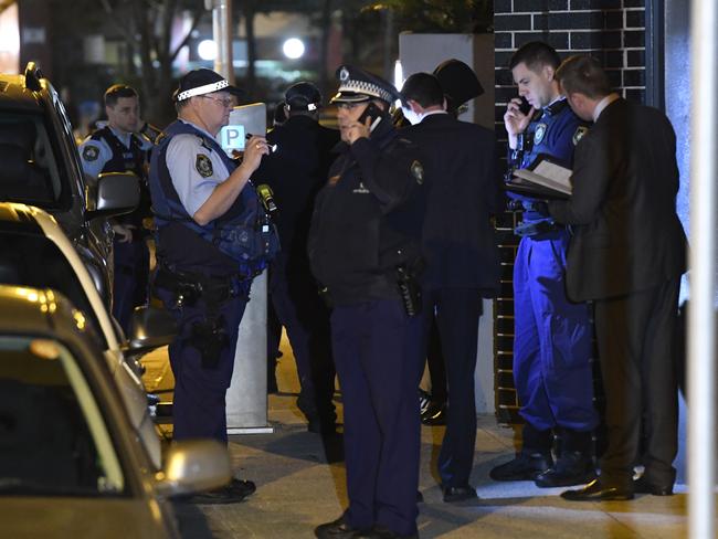 Pyrmont Stabbing:  EXCLUSIVE PICS OF ARREST: At around 10:50pm last night emergency services were called to the intersection of Pyrmont Bridge Rd and Wattle Street after reports of an assault. On arrival they found a man in his 20's suffering multiple facial wounds from a stabbing. The man was set upon by a group of up to 10 men. He was taken to RPA Hospital for treatment including surgery. After reviewing CCTV about 3 hours after the initial incident Police arrested an 18yo man (photos here) in a unit on Wattle Street adjacent to the crime scene. Police setup a crime scene as specialist forensic investigators examined the evidence. Another 15yo man was also arrested at his home in Eastwood and taken to Ryde Police Station. Picture: Gordon McComiskie