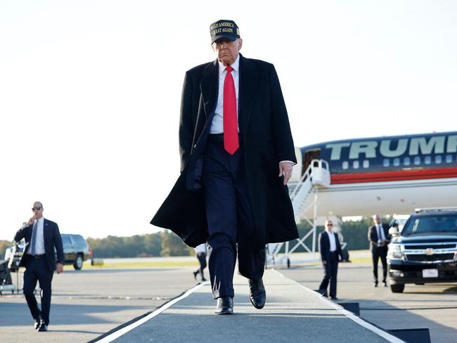 KINSTON, NORTH CAROLINA - NOVEMBER 03: Republican presidential nominee, former U.S. President Donald Trump arrives for a campaign rally at Kinston Regional Jetport on November 03, 2024 in Kinston, North Carolina. With only two days until the election, Trump is campaigning for re-election on Sunday in the battleground states of Pennsylvania, North Carolina and Georgia. Chip Somodevilla/Getty Images/AFP (Photo by CHIP SOMODEVILLA / GETTY IMAGES NORTH AMERICA / Getty Images via AFP)