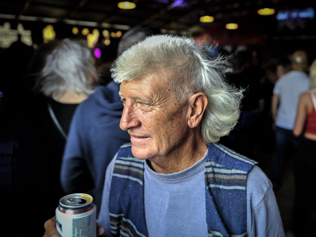 Participants are seen during Mulletfest, a special event designed to celebrate the hairstyle that's all about business at the front, party at the back, at Chelmsford Hotel in Kurri Kurri, NSW. (AAP Image/Perry Duffin) 