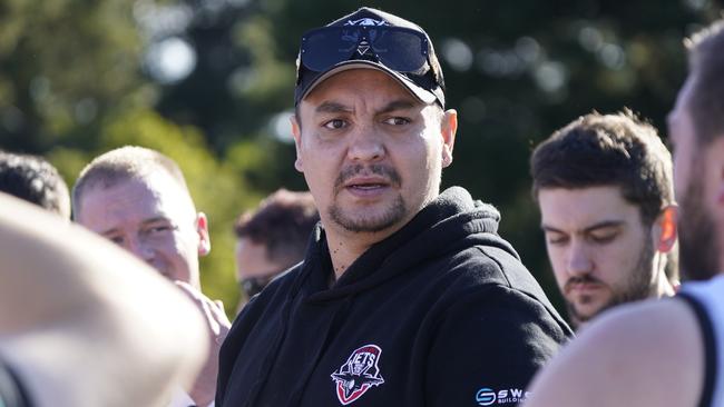 Ryan Hoy addresses the Black Rock players. Picture: Valeriu Campan