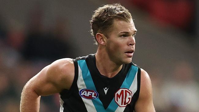 SYDNEY, AUSTRALIA - JUNE 16: Dan Houston of the Power in action during the round 14 AFL match between Greater Western Sydney Giants and Port Adelaide Power at ENGIE Stadium on June 16, 2024 in Sydney, Australia. (Photo by Jason McCawley/AFL Photos/via Getty Images)