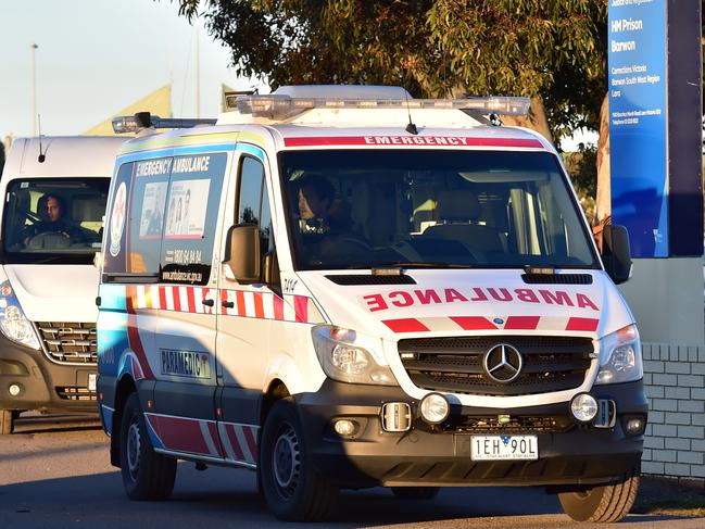 An ambulance departs the Barwon Prison complex. Picture: Stephen Harman