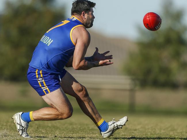 Legendary Cranbourne full forward Marc Holt marks this year against Wandin. Picture: Valeriu Campan