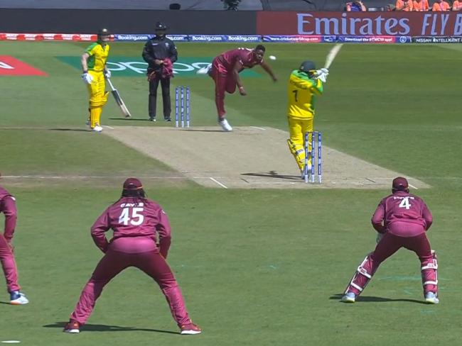 Usman Khawaja struggles against another short delivery.