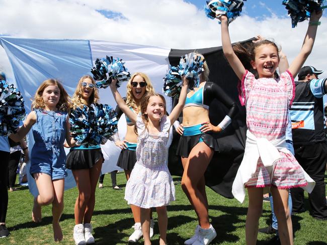 Youngsters join the Sharks cheerleaders. Picture: Stephen Cooper