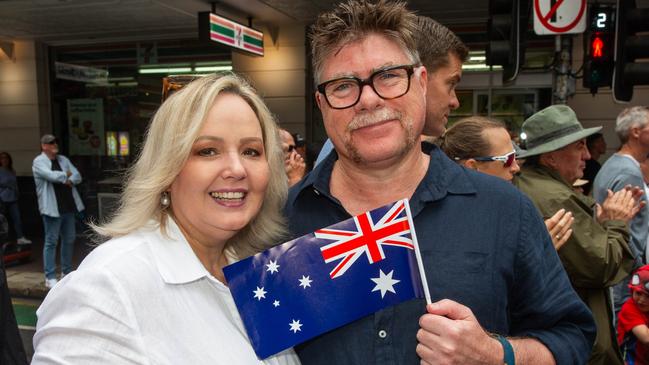 Thousands of people have braved the rain to gather in Brisbane for Anzac Day services. Picture: Grace Kessels