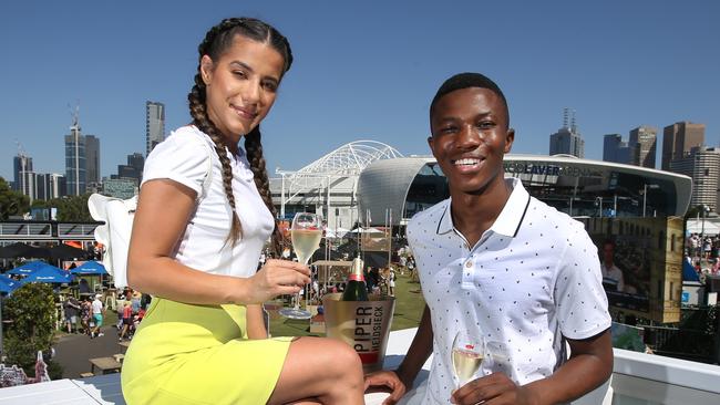 Bars and restaurants around Rod Laver Arena would encourage tourists to stay. Picture: David Caird