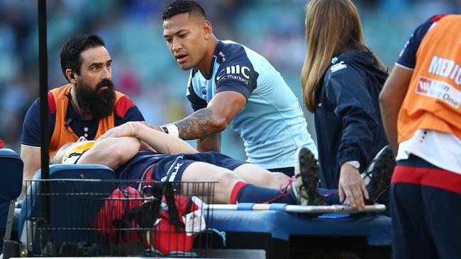 Israel Folau shows his concern as Reece Hodge is stretchered off.