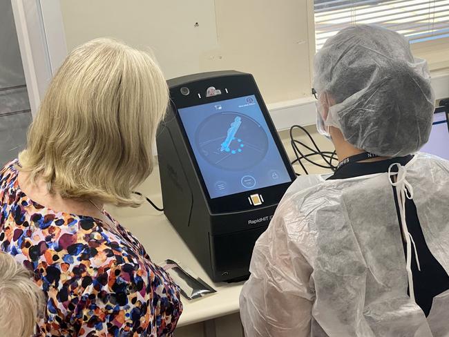 Chief Minister Eva Lawler examines new NT Police Forensics Science Branch technology.