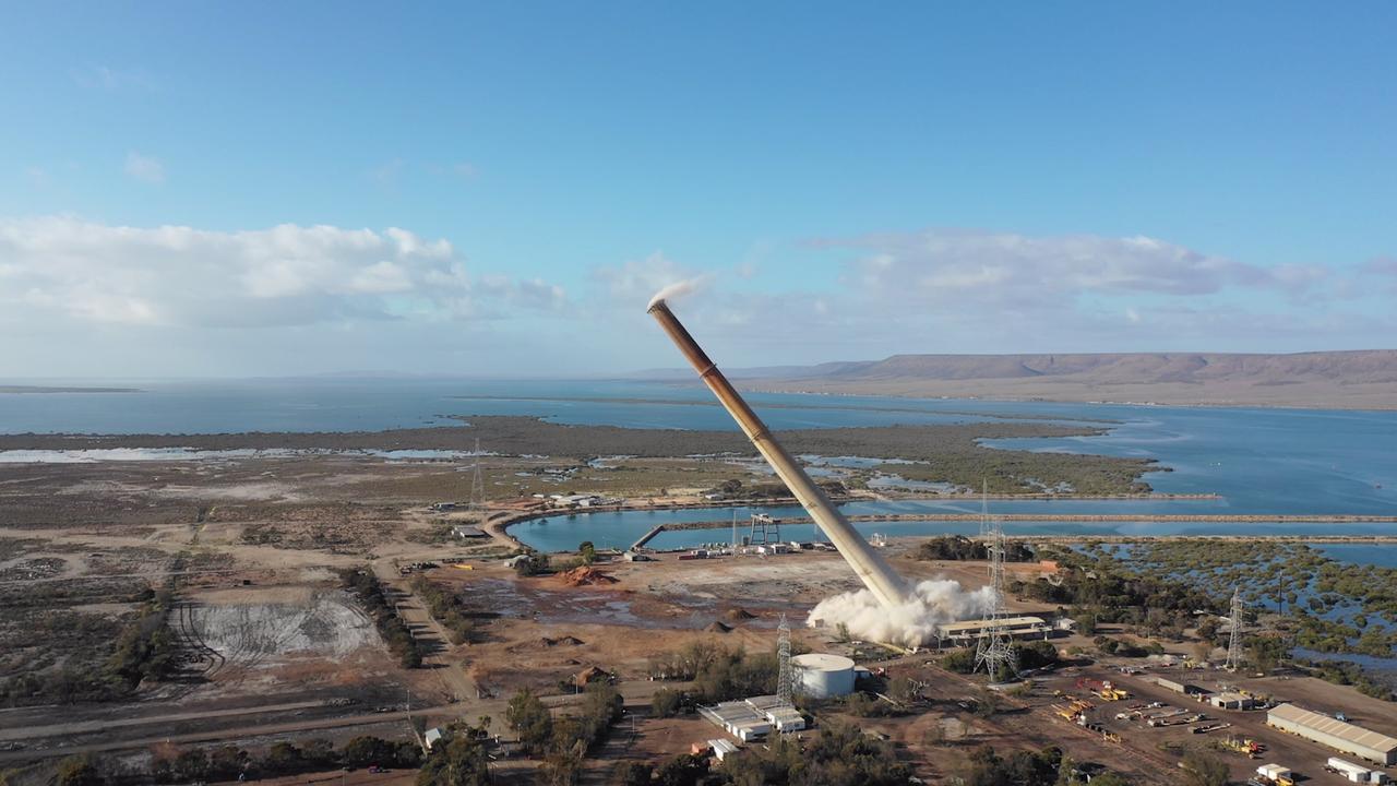 A 200-metre chimney stack falls to the ground during the destruction of South Australia’s last remaining coal-fired power station. Picture: Supplied