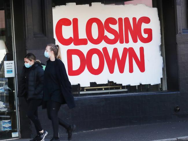 MELBOURNE, AUSTRALIA- NewsWire Photos OCTOBER 16, 2020: People walk past a closing down sign in Brunswick street during COVID-19 lockdown in Melbourne. Picture: NCA NewsWire/ David Crosling