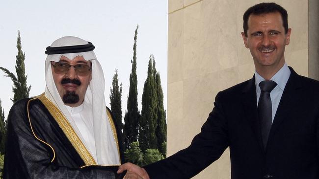 Bashar al-Assad, right, shakes hands with late Saudi King Abdullah bin Abdel-Aziz in Damascus.