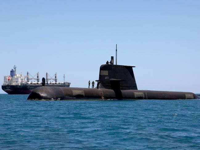 Collins Class Submarine, HMAS Sheean, in Cockburn Sound, Western Australia. *** Local Caption *** Officers and sailors at work on Collins Class Submarine, HMAS Sheean, whilst transiting Cockburn Sound in Western Australia.   HMAS Sheean is the fifth Collins Class Submarine built by ship building company, ASC Pty Ltd, in Adelaide, Australia.