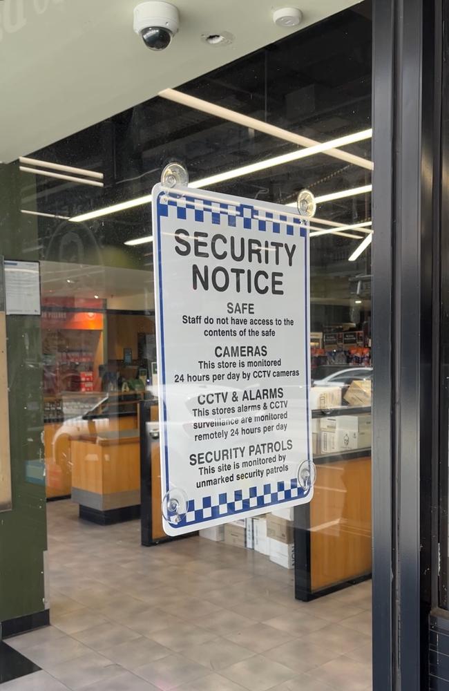 Traders display security notices at their stores on Chapel St.