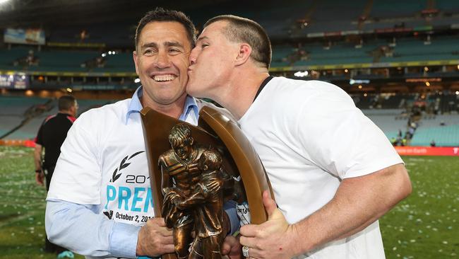 Shark's Paul Gallen kisses Shark's coach Shane Flanagan after winning the 2016 NRL Grand Final between the Cronulla Sharks and Melbourne Storm at ANZ Stadium, Sydney. Picture: Brett Costello